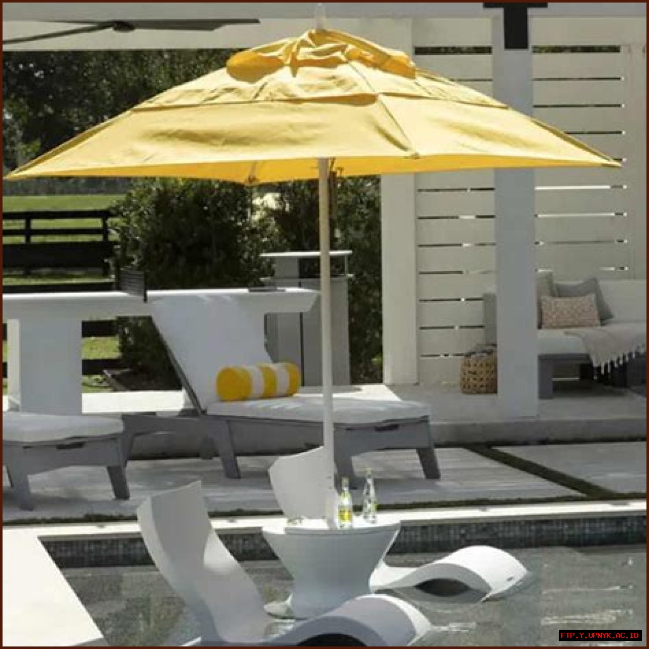 Essential Umbrella Protection By The Pool: A Sunbathing Essential