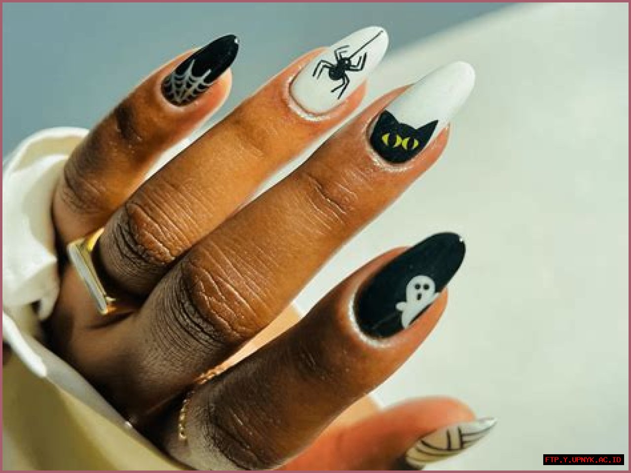 Spooktacular Black And White Halloween Nail Art