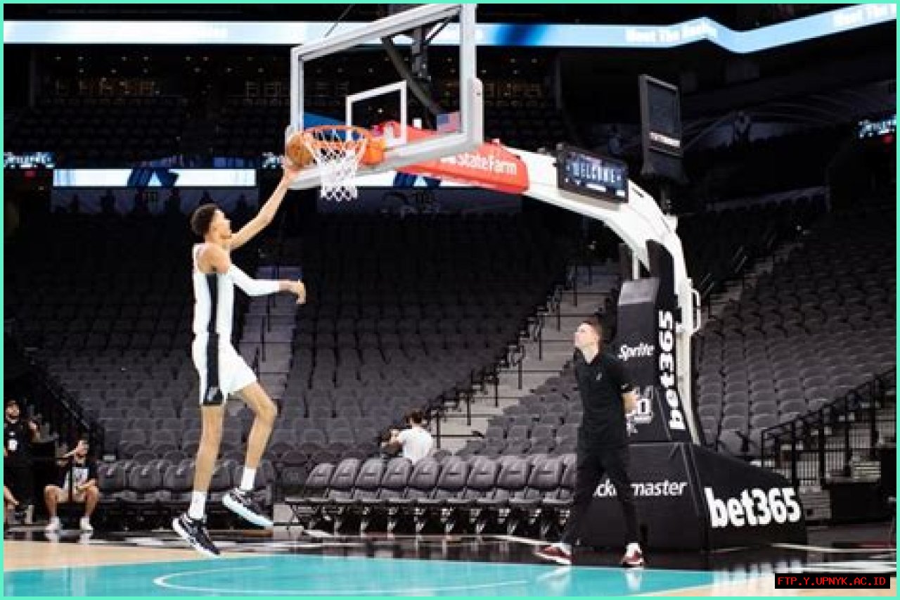 The Towering Height Of Eve Wembanyama: A Basketball Giant