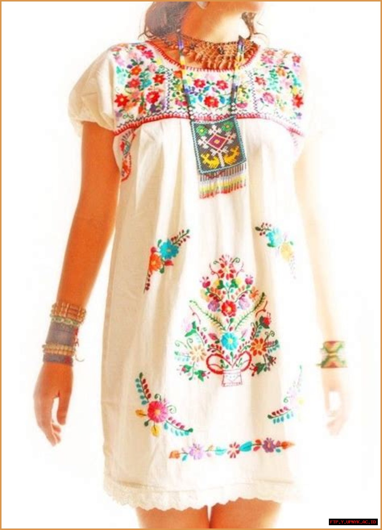 Timeless Style: Embroidered Dresses Adorned With Tropical Palm Leaves